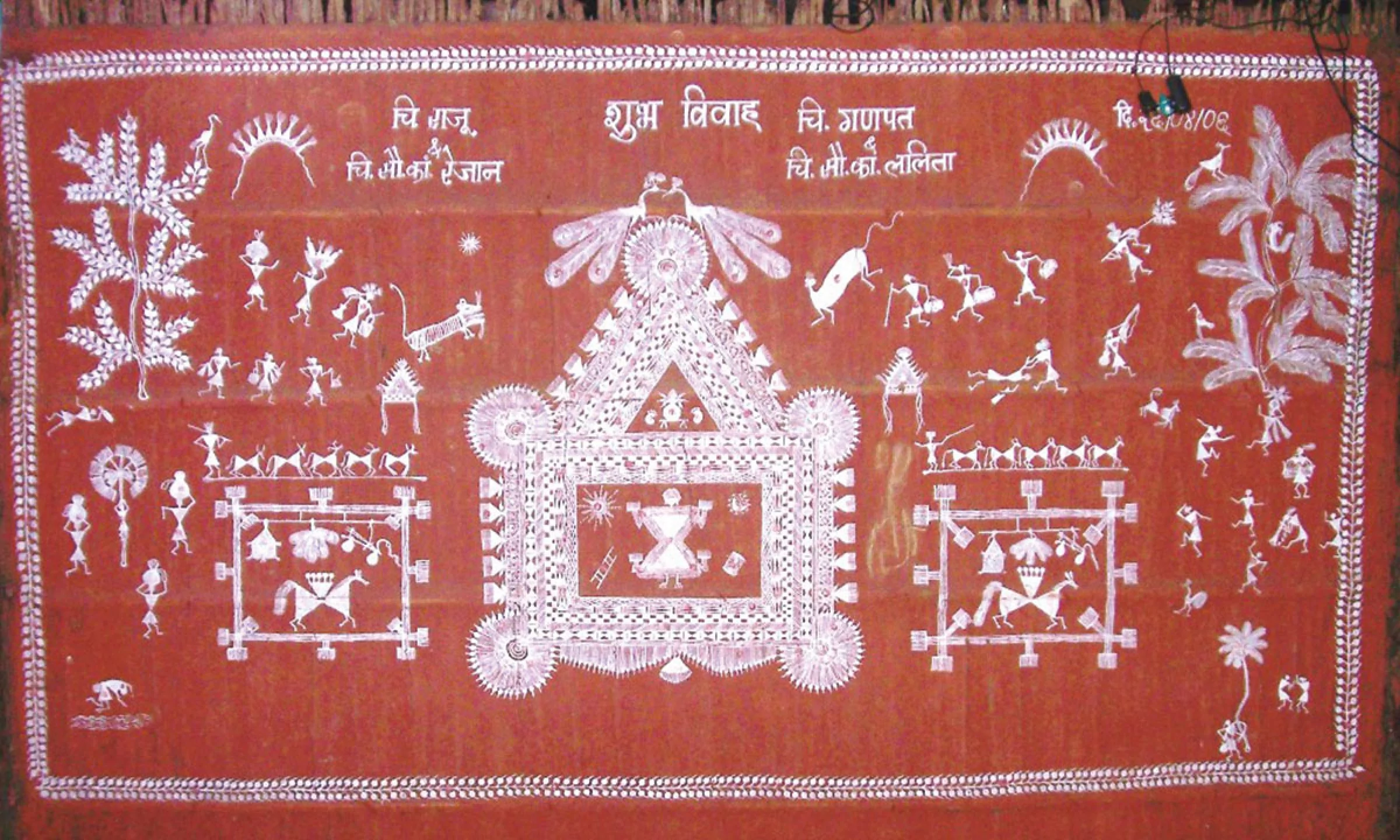 A traditional Warli painting done in white over a red ochre background. Panchasiriya is in the dev chauk on both sides of the lagna chauk in the centre.